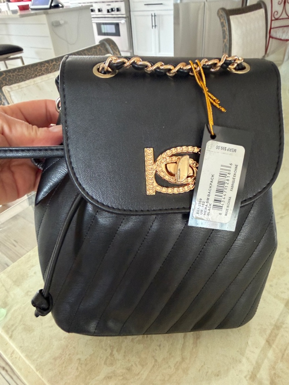 bebe Black Quilted Backpack with Gold Chain Accent